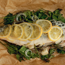 Feast on Italian-style sea bass baked in a package