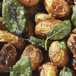 New potatoes in their skin with sage butter will ensure you win at dinner