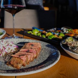 Settle in for steak, seafood and sensational cocktails at Red Steakhouse & Bar at Sanctuary Cove