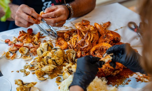 Don a bib and get your hands dirty at Broadbeach's new seafood joint, Kickin'Inn