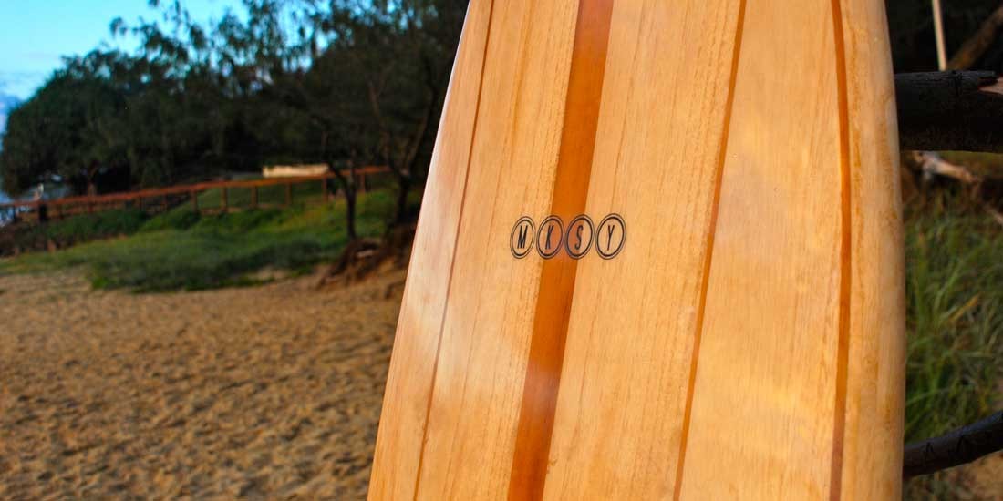 MKSY handcrafts eco-friendly wooden surfboards