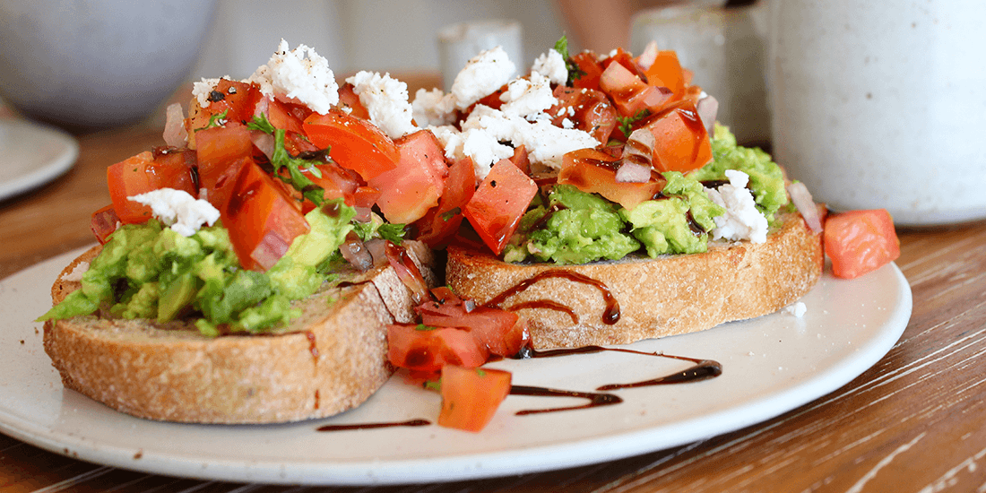 Avo Zen topped with tomato salsa, Greek fetta and balsamic