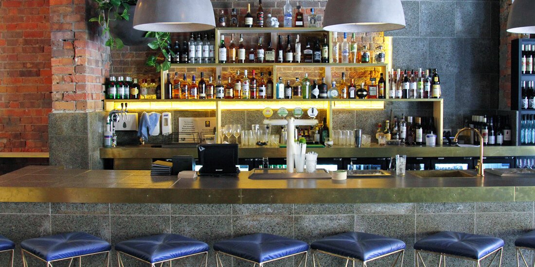 Settle in for morsels and moonshine at GreenHill Bar and Dining