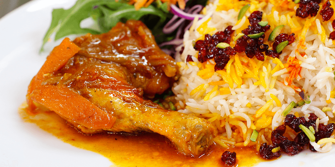 Zereshk polo – chicken marinated in onions and saffron, served with sauteed barberry rice