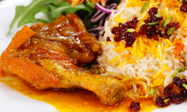 Zereshk polo – chicken marinated in onions and saffron, served with sauteed barberry rice