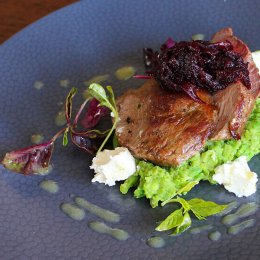 Roast lamb rump with smashed beans, fetta, mint and beetroot relish