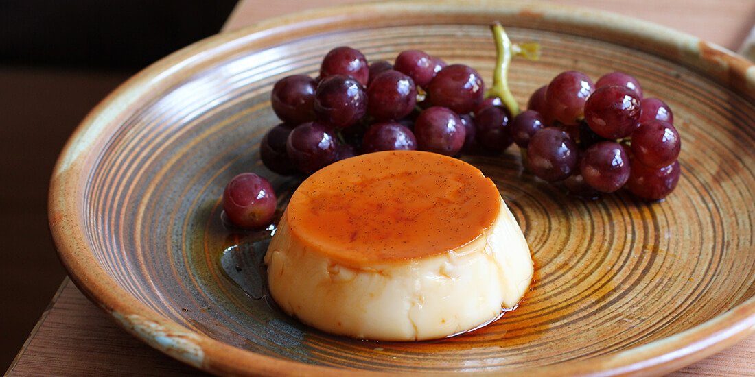 Creme caramel with drunk fruits