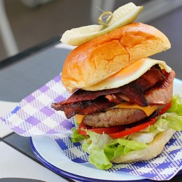 Bite down on beefy burgers at breezy bar and eatery Master Toms