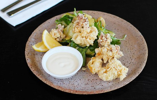 Salt and pepper calamari with zucchini, artichoke and rocket salad