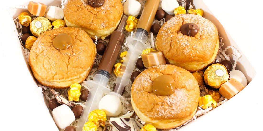 Ditch the flowers and sweeten the deal with a bouquet of doughnuts from Sugar Gathered