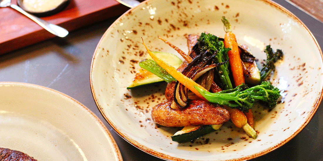 Duck wings with coal-roasted vegetables