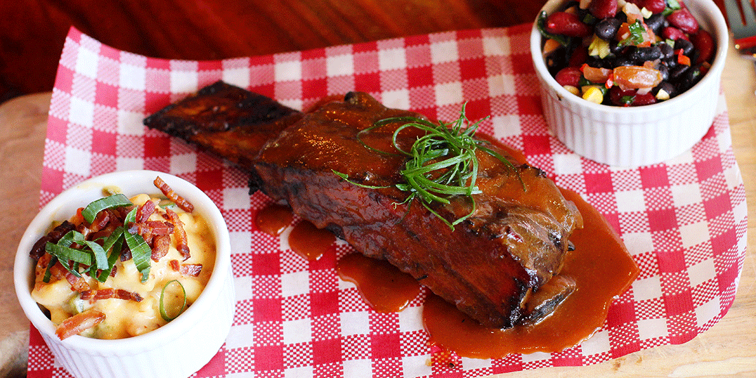 Beef brisket served with mac 'n' cheese and Cowboy Caviar