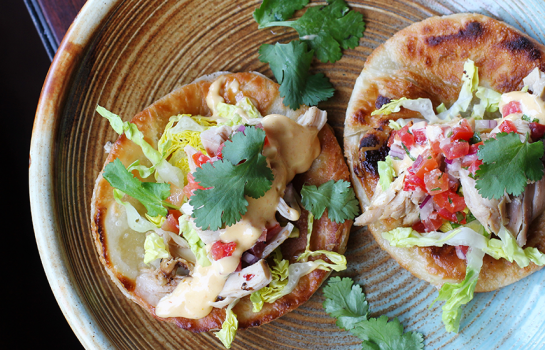 Paratha tacos with chicken, lettuce, jalapeno salsa and sriracha mayonnaise