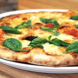 Woodfired pizzas and rock ‘n' roll combine at Caxton Street's Enzo & Sons