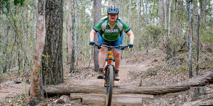 Get good at riding a mountain bike (women only)
