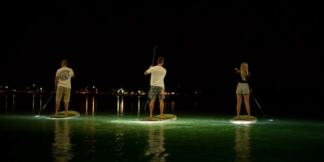 These glow-in-the-dark SUP tours are your next nighttime adventure