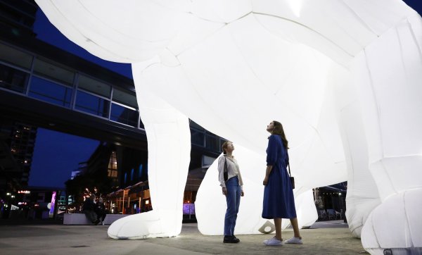 What’s that?! A huge humanoid inflatable art installation is popping up at Portside Wharf