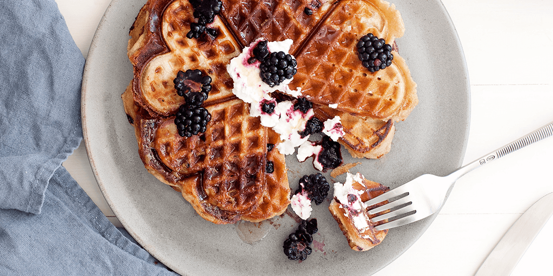 Hoe in to French toast waffles with berry compote