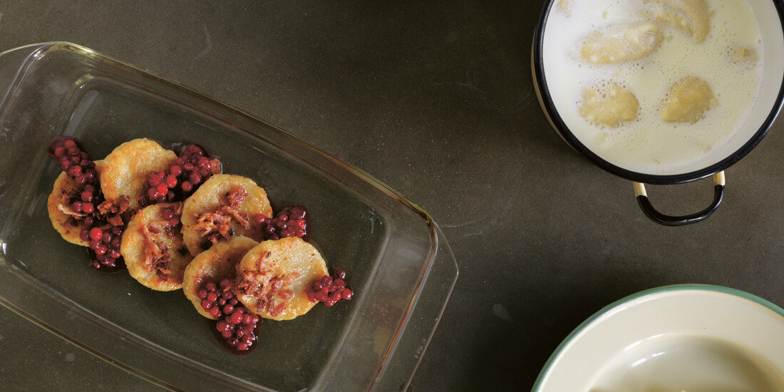 Feast on Swedish raw potato dumplings with sugared lingonberries