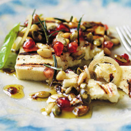 Treat your guests to grilled haloumi with pomegranate and sumac dressing