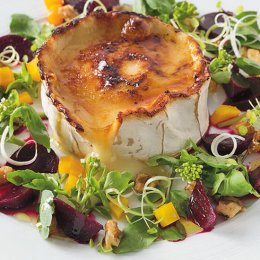 You do win friends with goats cheese brulee salad