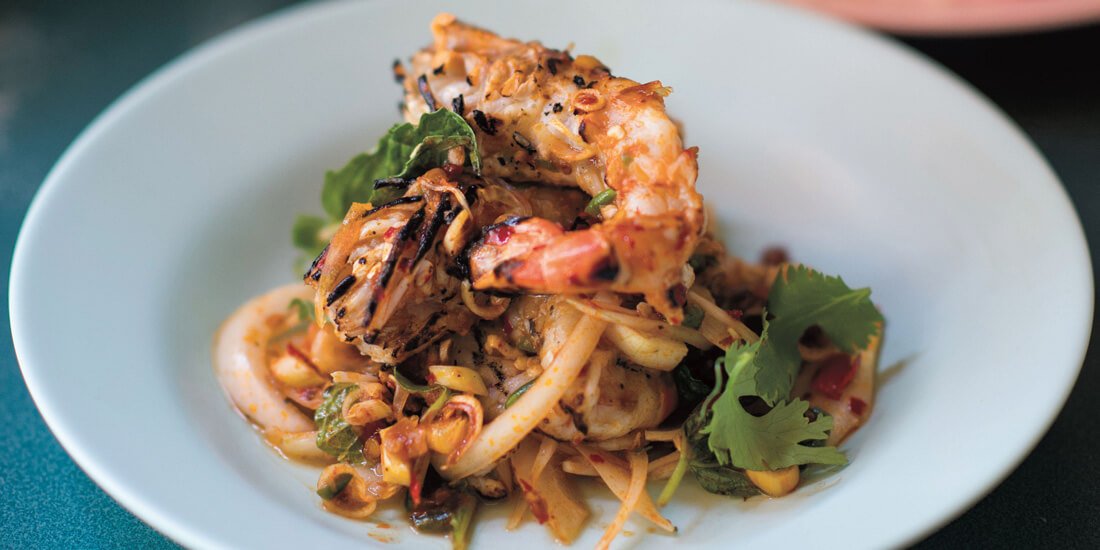 Kick off seafood season by whipping up a chargrilled spicy prawn salad