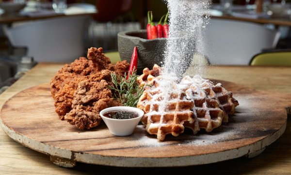 Sip bubbles and feast on fried chicken and waffles at QT's The Bazaar Brunch