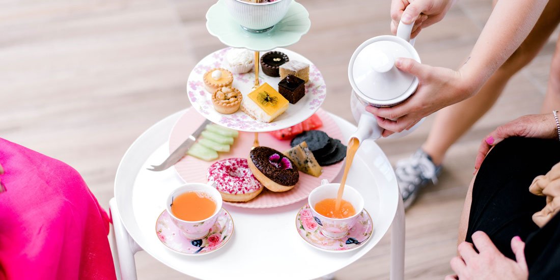 Sky-high sips and decadent delights await at Aviary Rooftop Bar's High Tea Bottomless Brunch