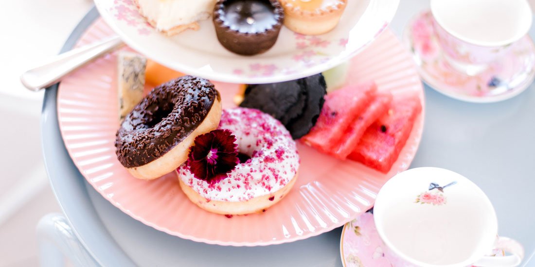 Sky-high sips and decadent delights await at Aviary Rooftop Bar's High Tea Bottomless Brunch