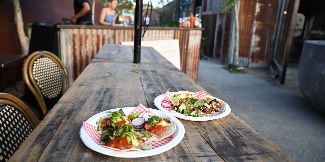 Sip on sunset margs and tuck into tacos at Dust Temple's Courtyard Summer Series