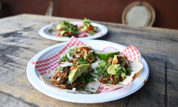 Sip on sunset margs and tuck into tacos at Dust Temple's Courtyard Summer Series