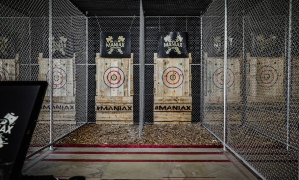 Hit a bullseye and drink from Viking horns at Surfers Paradise's new axe-throwing mecca, MANIAX