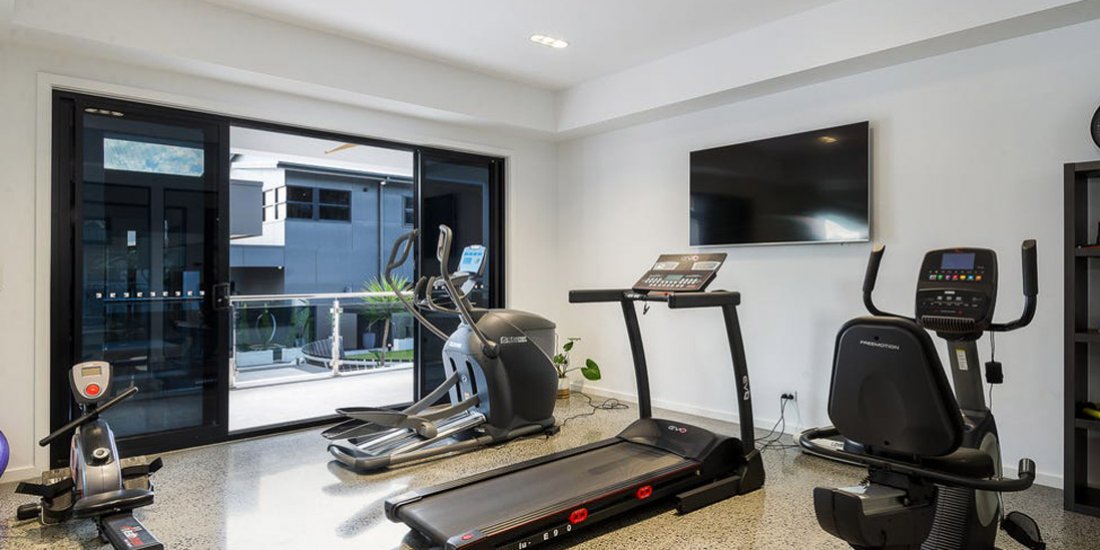 This impressive Brisbane house comes complete with a mancave, outdoor cinema, soccer field and two gyms