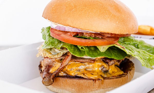 Wrap your mitts around a seriously stacked burger from Burger'd in Varsity Lakes