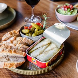 Embrace the temperature shift with shiraz and baked camembert by the fire pit at Carafe Wine