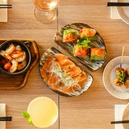 Snack on tsukune skewers, sizzling prawns and Japanese-curry arancini at Mermaid's Blessing of the Sun